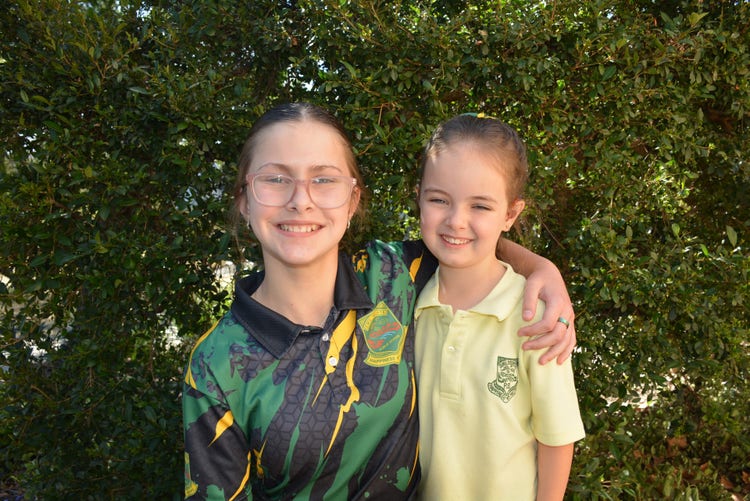 A year 6 girl with her kindy buddy
