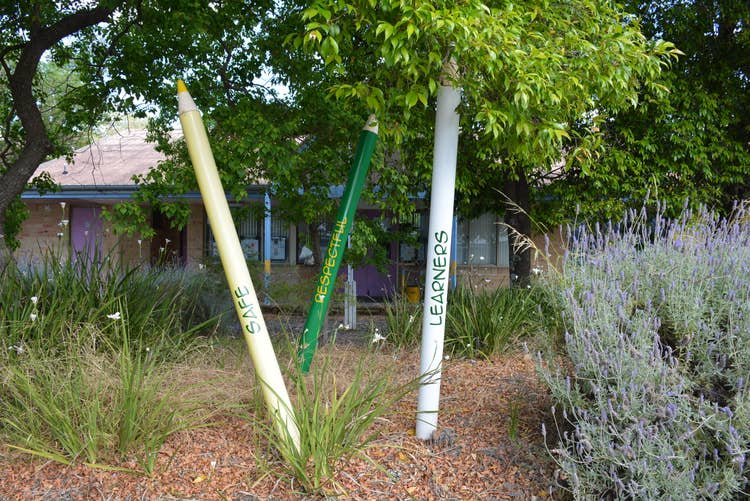 giant pencils in the garden saying safe respectful learners