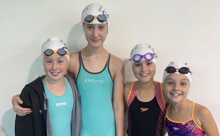 4 girls who represented the school at regional swimming relay