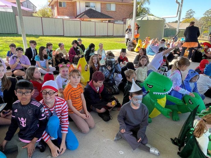 a large group of students dressed as their favourite book characters